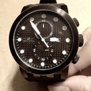 Black Invicta DNA racer watch.